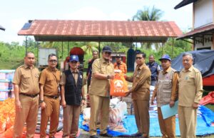 Sekda Aceh Utara Serahkan Bantuan untuk 13 Kecamatan Terdampak Banjir